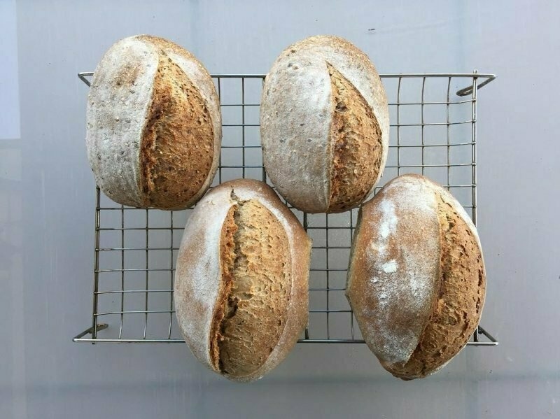 I appreciate fancy scoring when I see it, but there is also something marvellous about a loaf that so clearly reprises the seeds it came from.