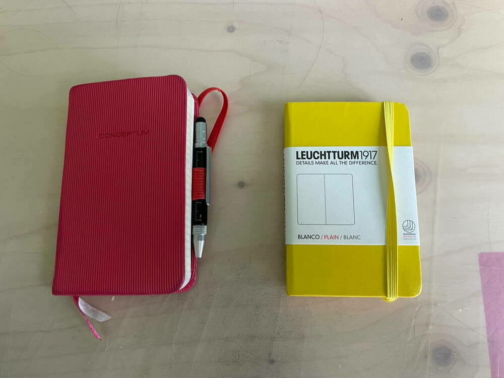 On the left side: Another notebook filled. On the right side: The next - yellow a color for the hope of a better year.
