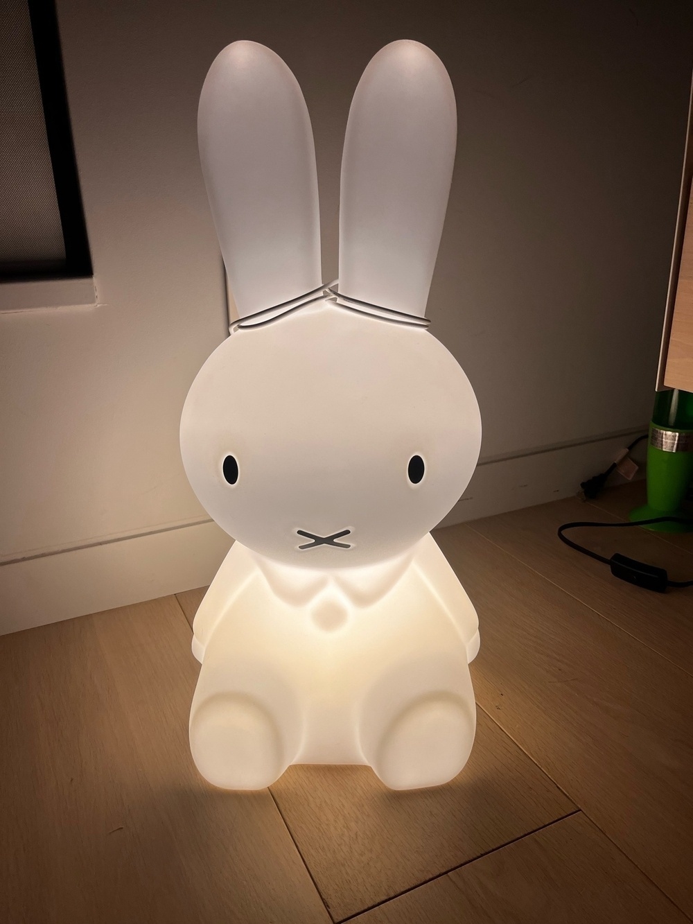 A childrenâ€™s night light looking like Miffy, a fictional rabbit