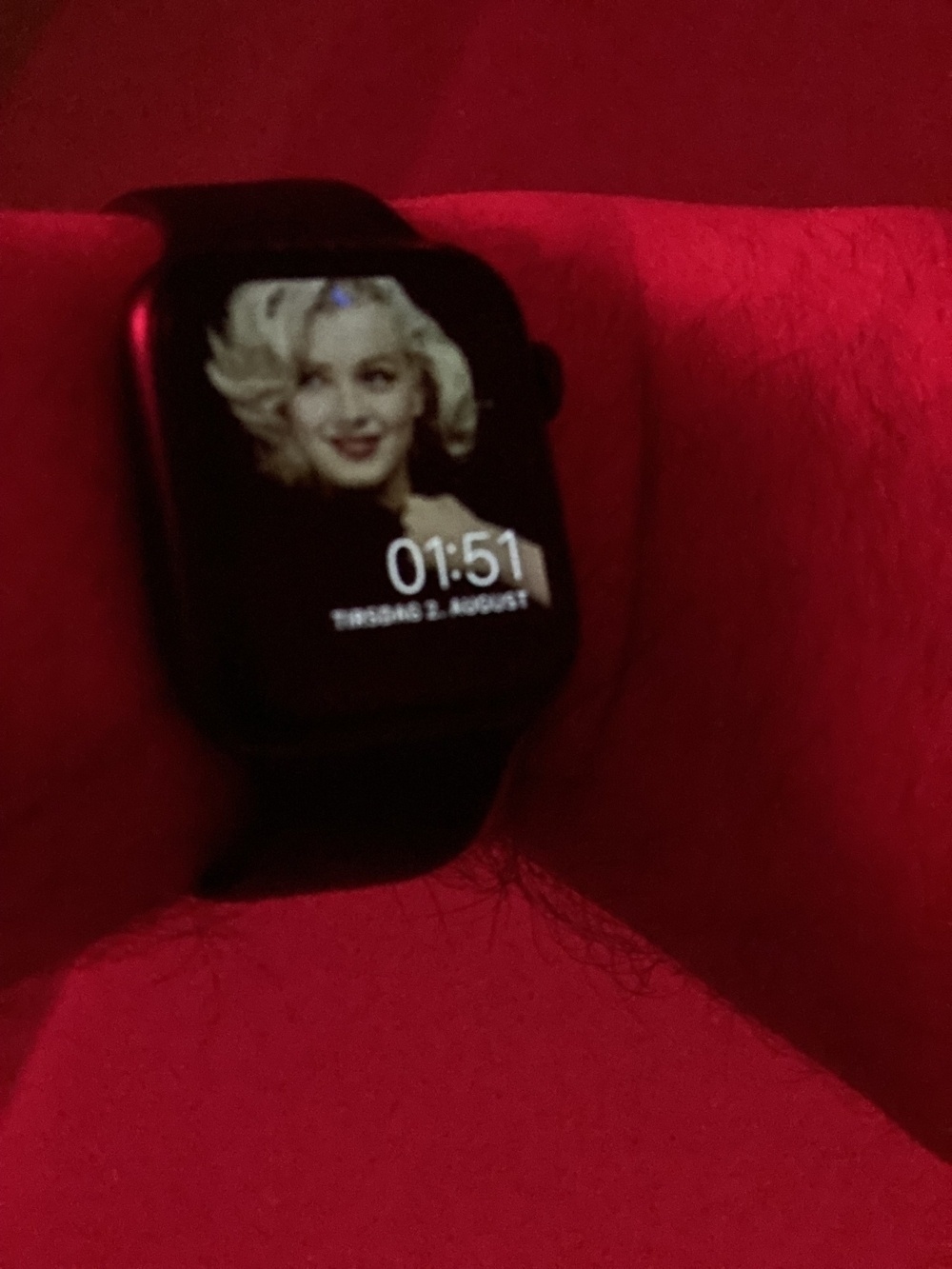 Apple Watch on my wrist, with a picture of Marilyn Monroe on the watch face.